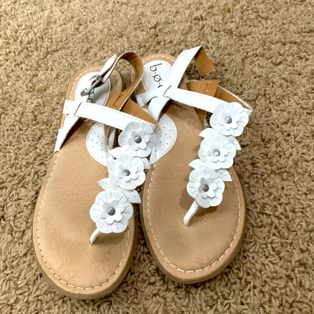 White sandals with floral detail